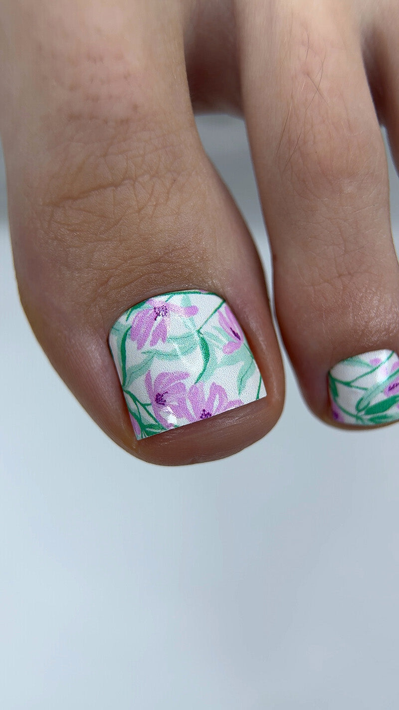 Pedicure Purple Flowers. Light Background. Nail wrap WR-716