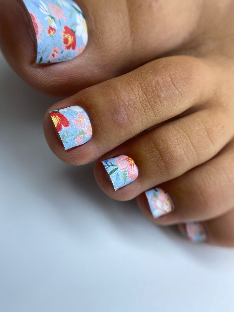 Pedicure Small Flowers. Blue Background. Nail wrap WR-717