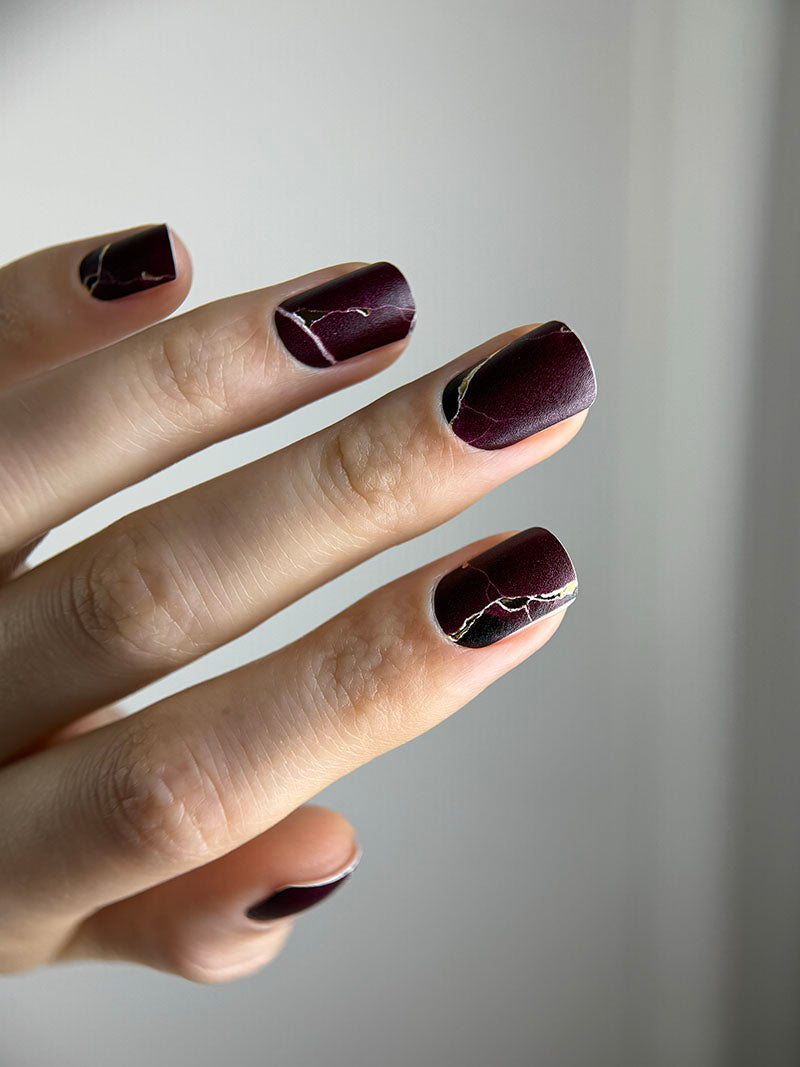 Manicure Burgundy with white stripe. Gold Foil. Nail wraps WM-415