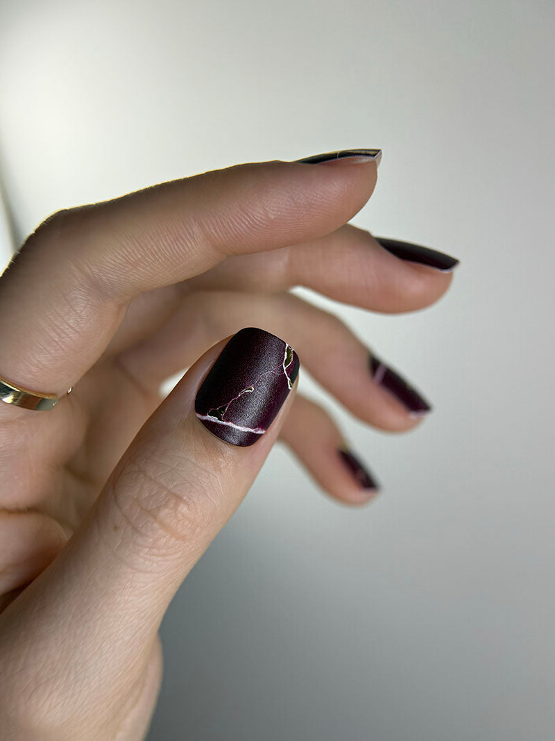Manicure Burgundy with white stripe. Gold Foil. Nail wraps WM-415
