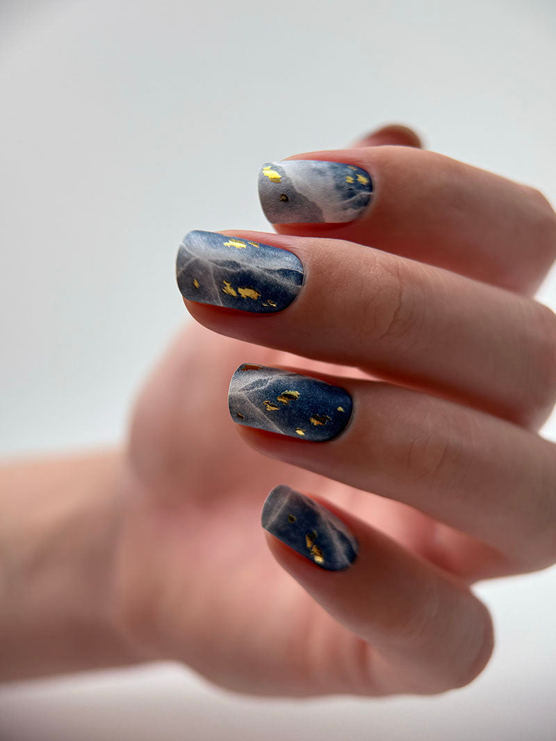 Manicure Cracks on dark blue. Gold Foil. Nail wraps WM-429