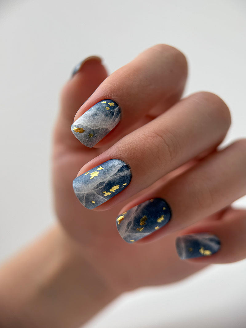 Manicure Cracks on dark blue. Gold Foil. Nail wraps WM-429