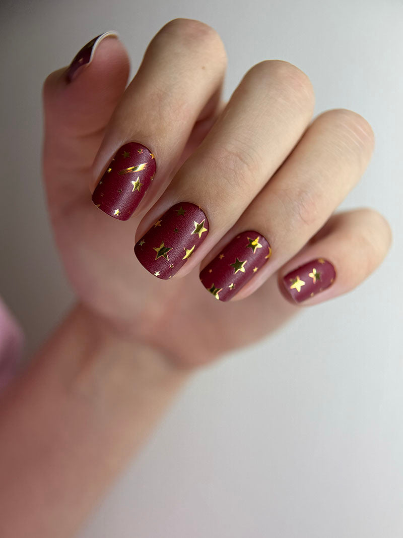 Manicure Stars. Burgundy Background. Gold Foil. Nail wraps WM-595