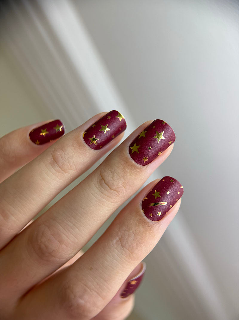 Manicure Stars. Burgundy Background. Gold Foil. Nail wraps WM-595