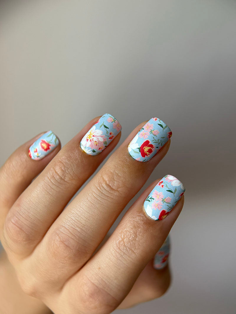 Manicure Small Flowers. Blue Background. Nail wrap WM-620