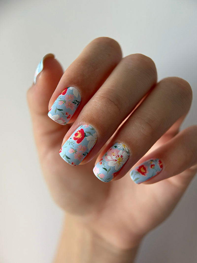 Manicure Small Flowers. Blue Background. Nail wrap WM-620
