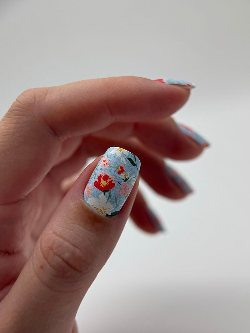 Manicure Small Flowers. Blue Background. Nail wrap WM-620