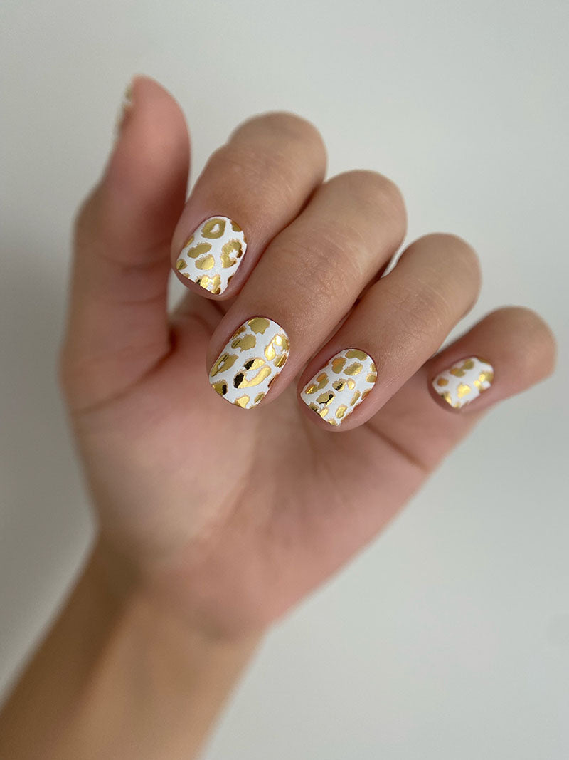 Manicure Leo. White Background. Gold Foil. Nail wrap WM-738