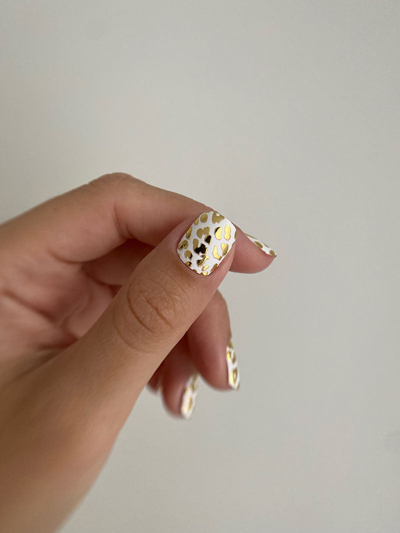 Manicure Leo. White Background. Gold Foil. Nail wrap WM-738