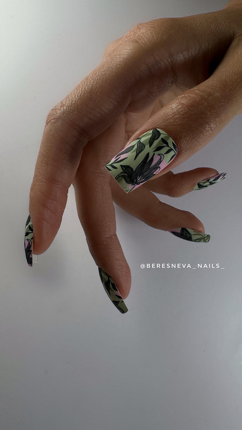 Manicure Black flowers. Khaki and pink background. Nail wrap WM-803