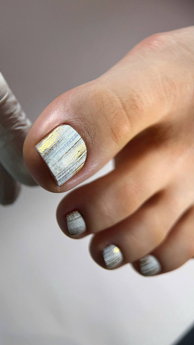 Pedicure Strokes with beige and gray. Gold Foil. Nail wraps WR-406