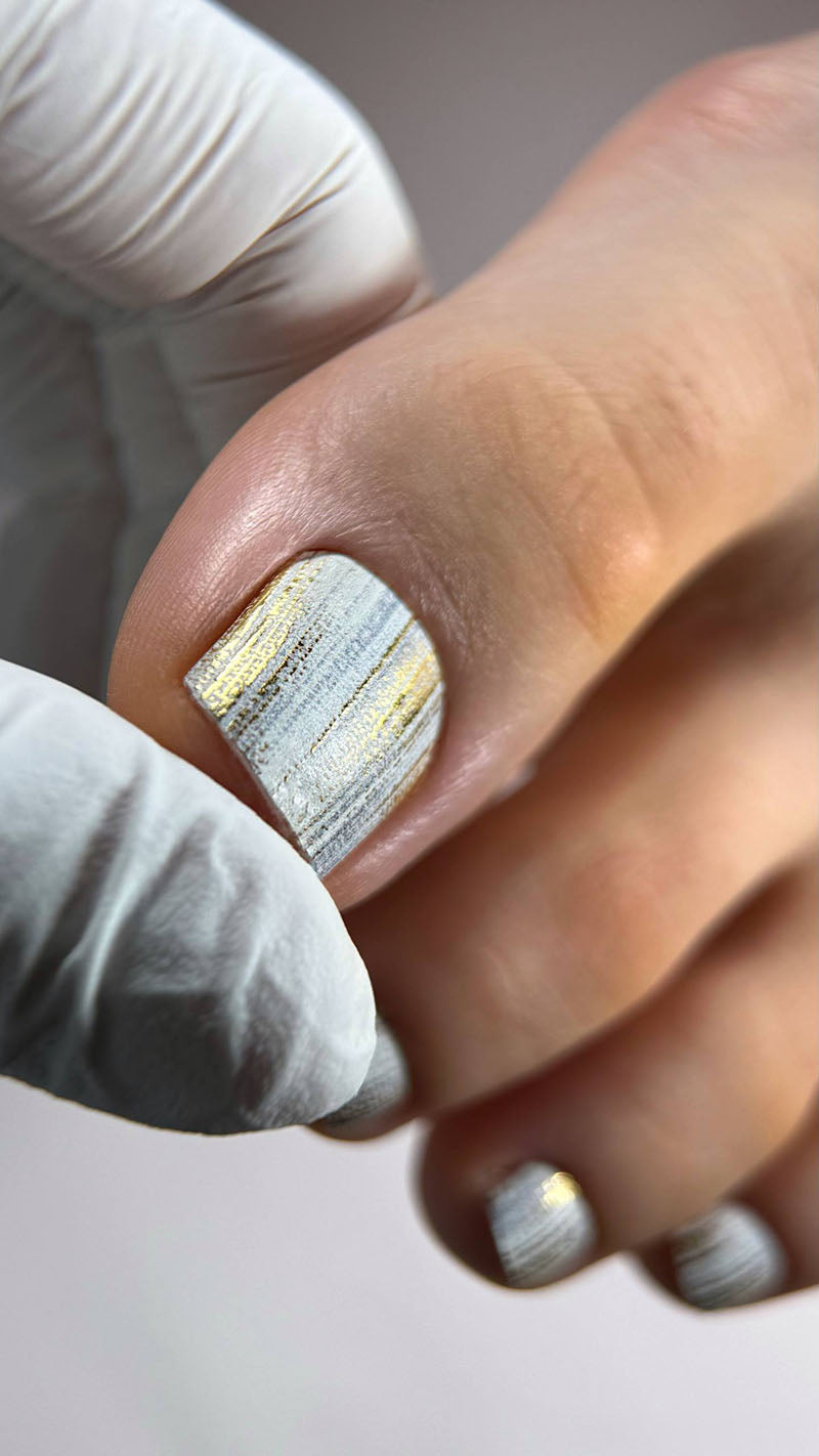 Pedicure Strokes with beige and gray. Gold Foil. Nail wraps WR-406