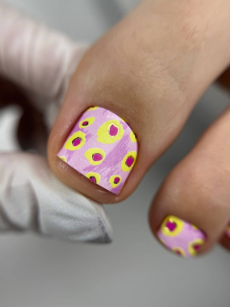 Pedicure Yellow Spots. Pink Background. Foil gold. Nail wrap WR-602