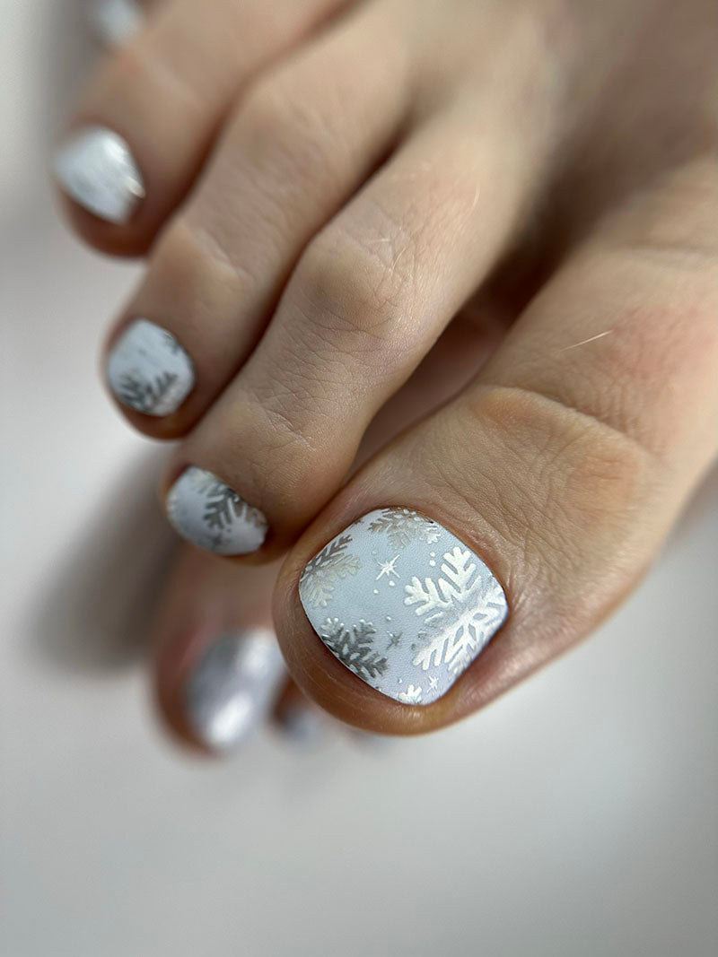 Pedicure Snowflakes. Blue Background. Foil silver. Nail wrap WR-609