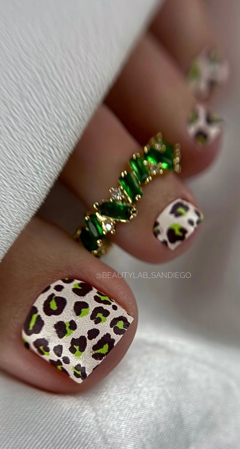 Pedicure Leo. Beige Background. Green Spots. Nail wrap WR-684