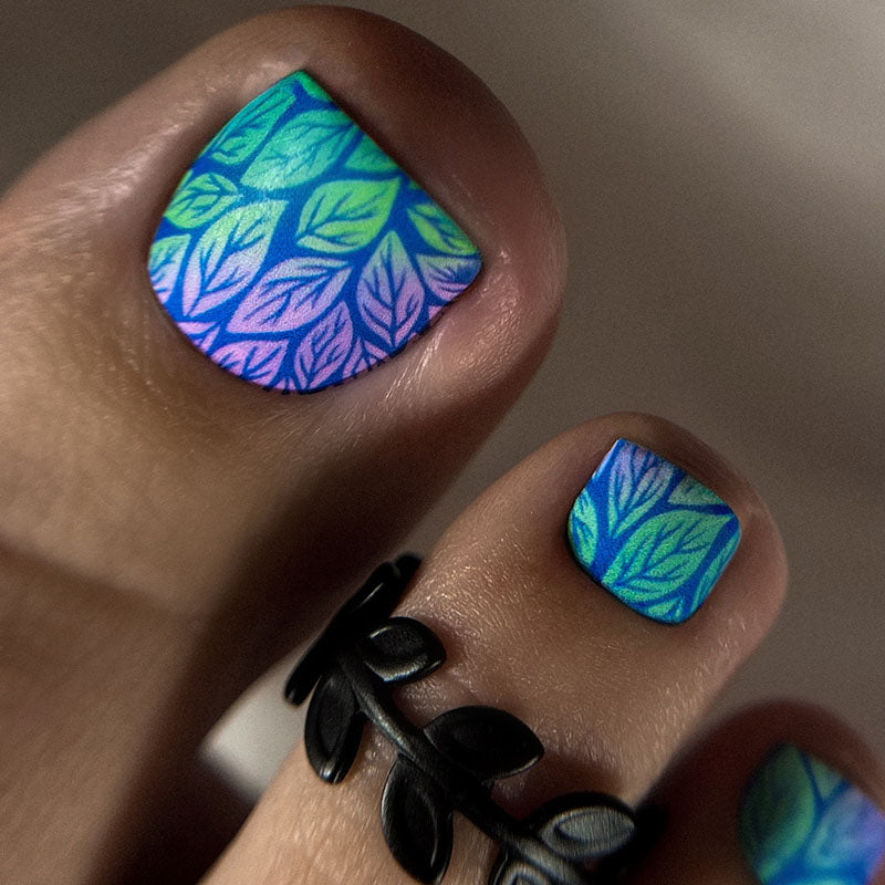 Pedicure Gradient Leaves. Blue Background. Nail wrap WR-702