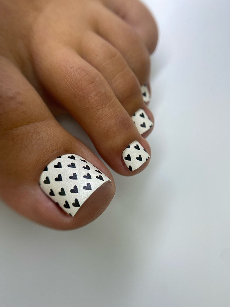 Pedicure Black Hearts. Milky Background. Nail wrap WR-726