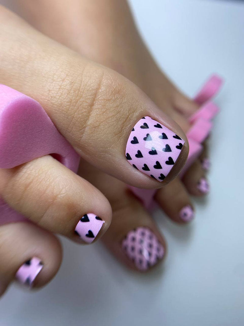 Pedicure Black Hearts. Pink Background. Nail wrap WR-727