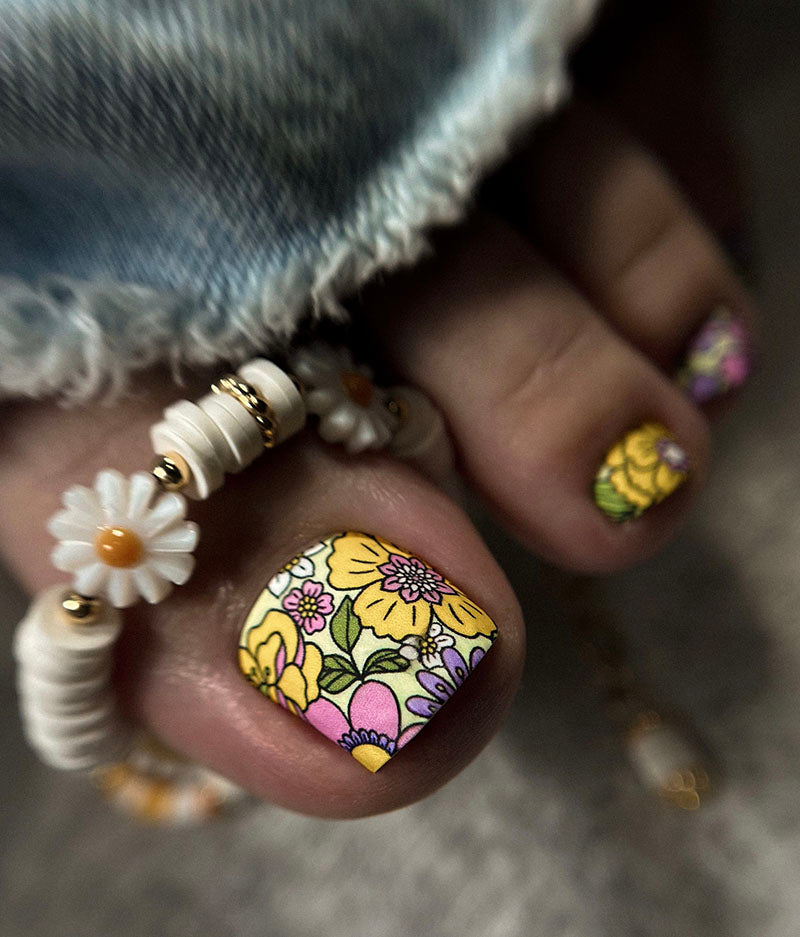 Pedicure Flowers on a light green background. Nail wrap WR-758