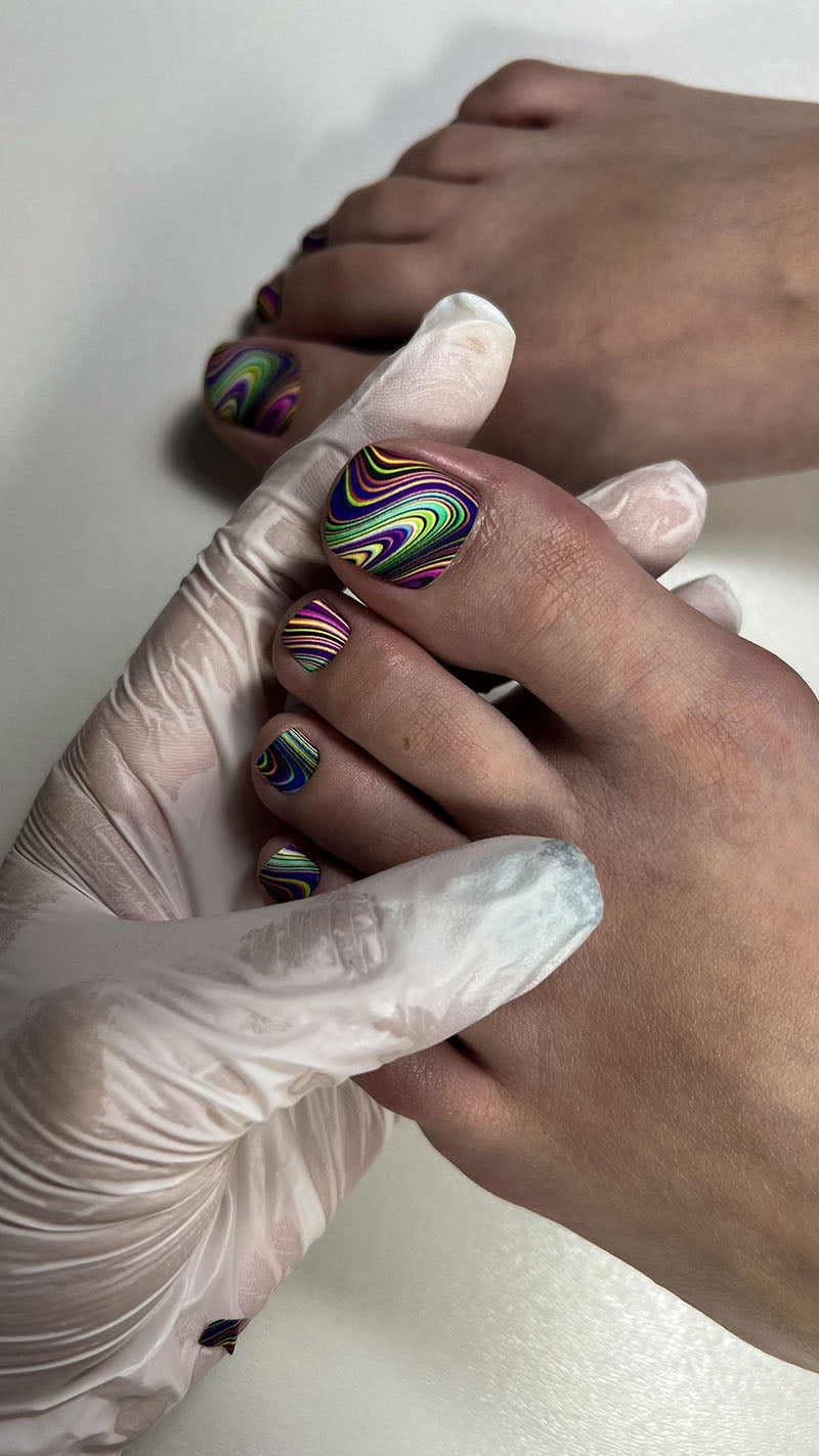 Pedicure Divorces with yellow and purple. Nail wrap WR-840